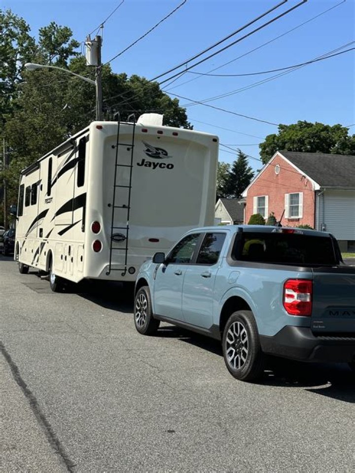 Can a Ford Edge be flat towed behind a motorhome?