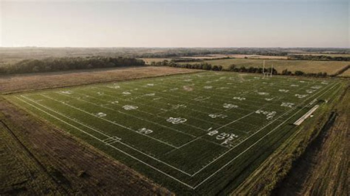 How big is 80 acres in football fields