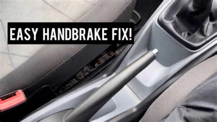 How do I get my handbrake button unstuck?
