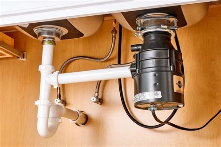 How do you clean a slow kitchen sink drain