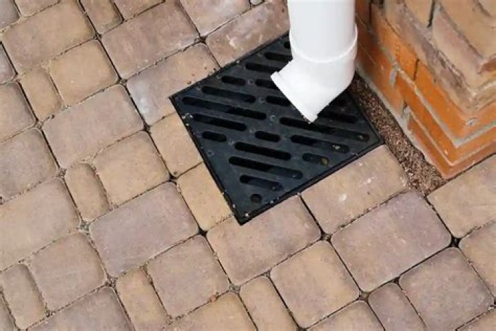 How do you clear a clogged outside drain