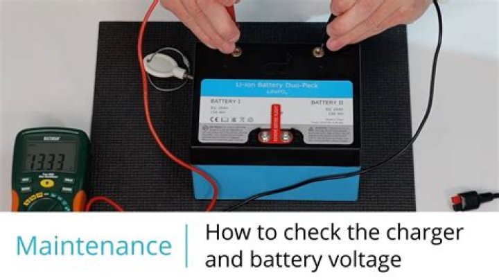 How do you test a battery charger on a generator?