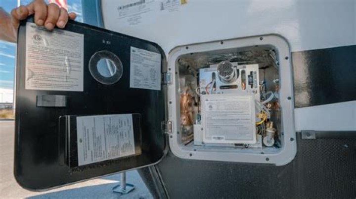 How does an RV hot water heater work?