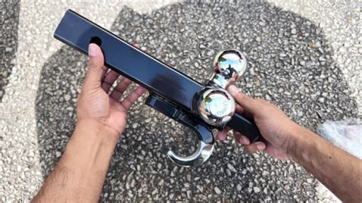 How does ball hitch lock work?