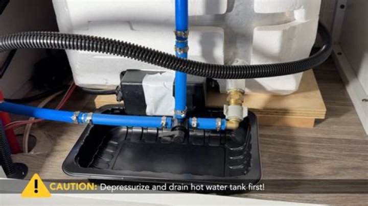 How does RV water heater fill up?