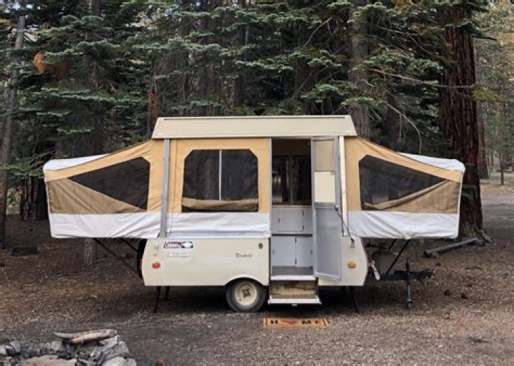 How much does a 1995 Coleman pop up camper weigh?