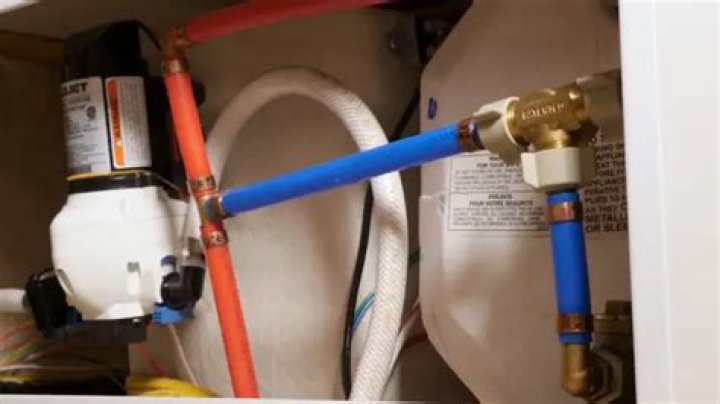 How to disengage a water heater bypass system?