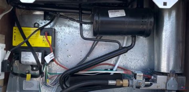 How to remove gas line from Norcold 3163 refrigerator?