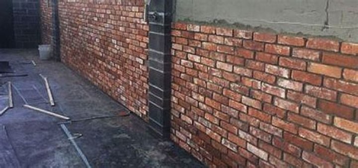 What do you use to stick brick slips