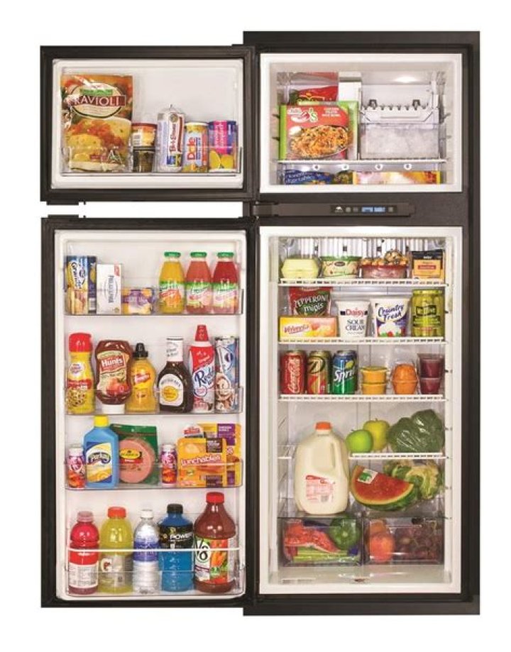 What does no AC alarm mean on Norcold refrigerator?