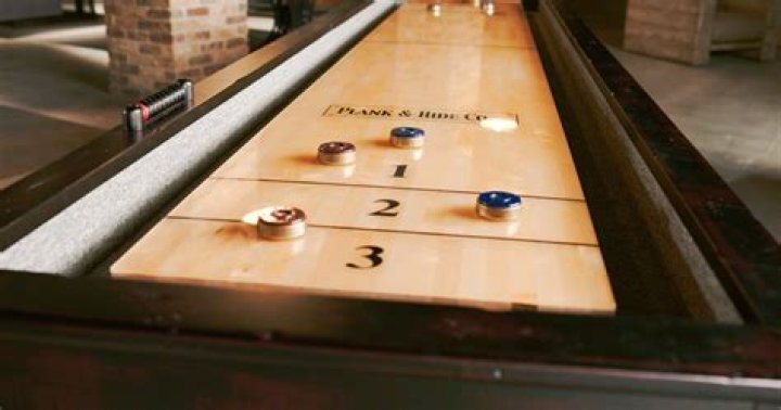 What is a shuffleboard made of