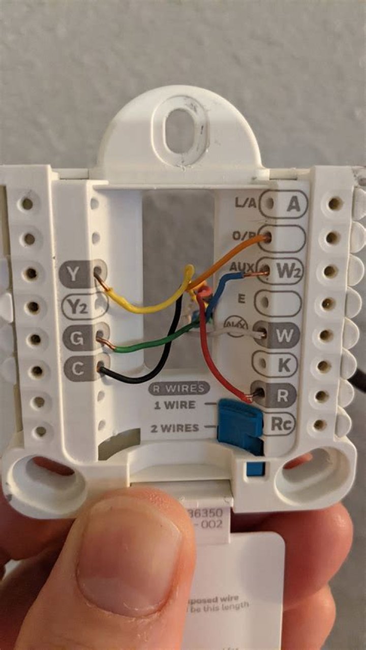 Where does white wire go on thermostat?