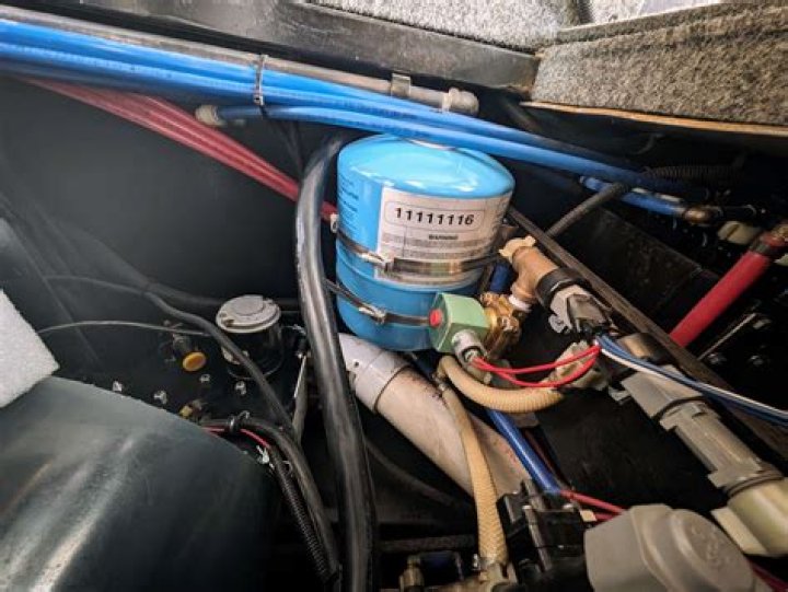 Where to put an accumulator tank in an RV?