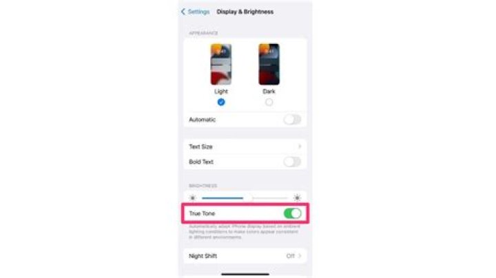 Why does iPhone 12 Keep dimming?